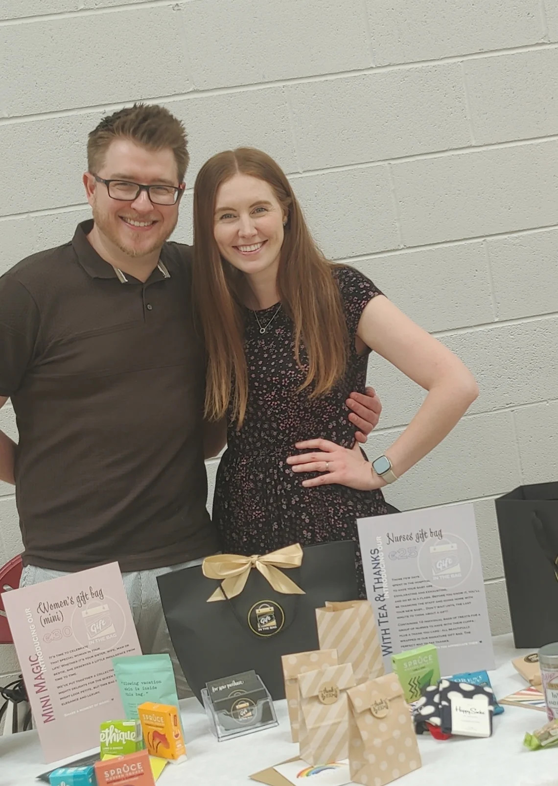 Pamela Gilligan, owner of Gift in the Bag, displaying products at an event.